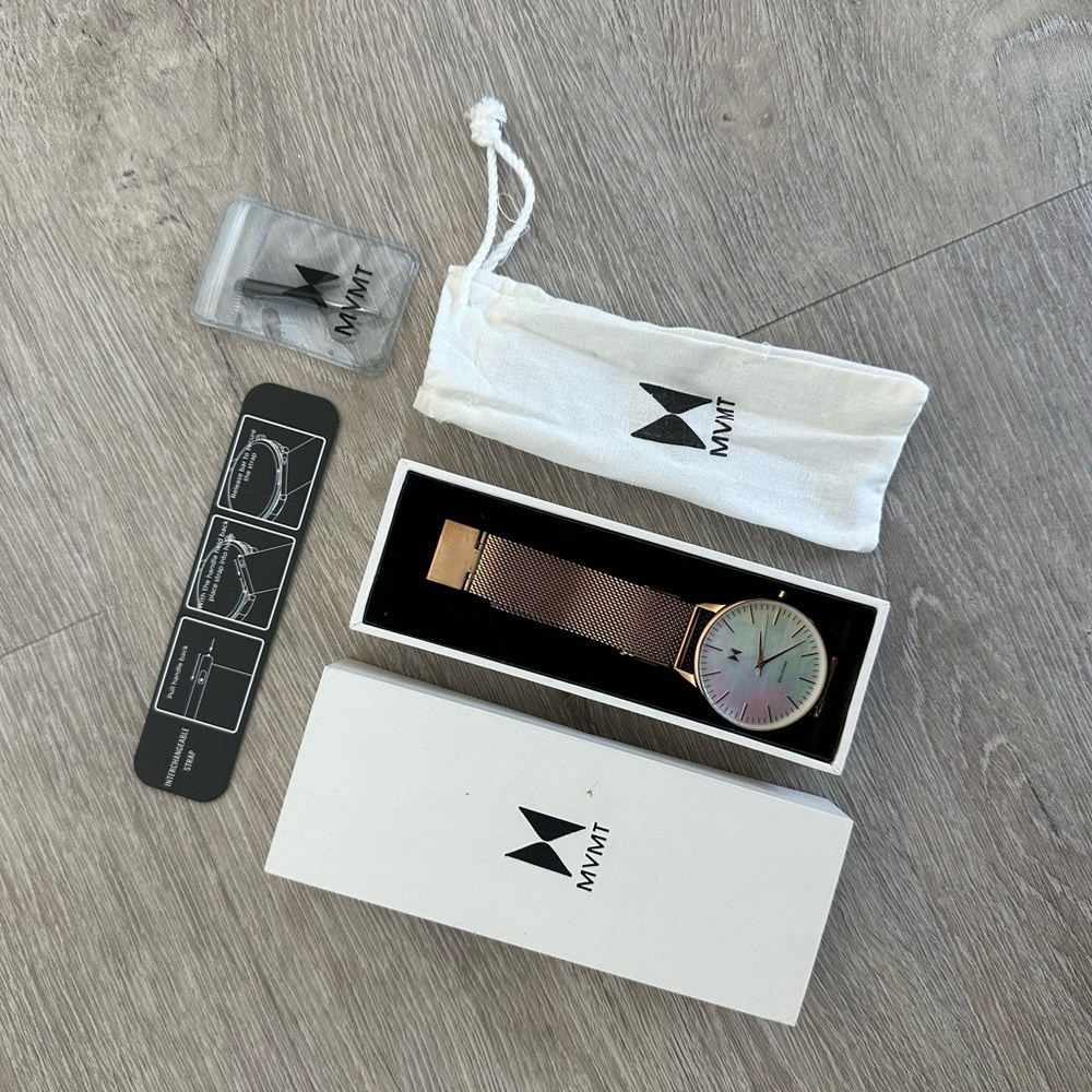 MVMT watch with in gold with pearl face